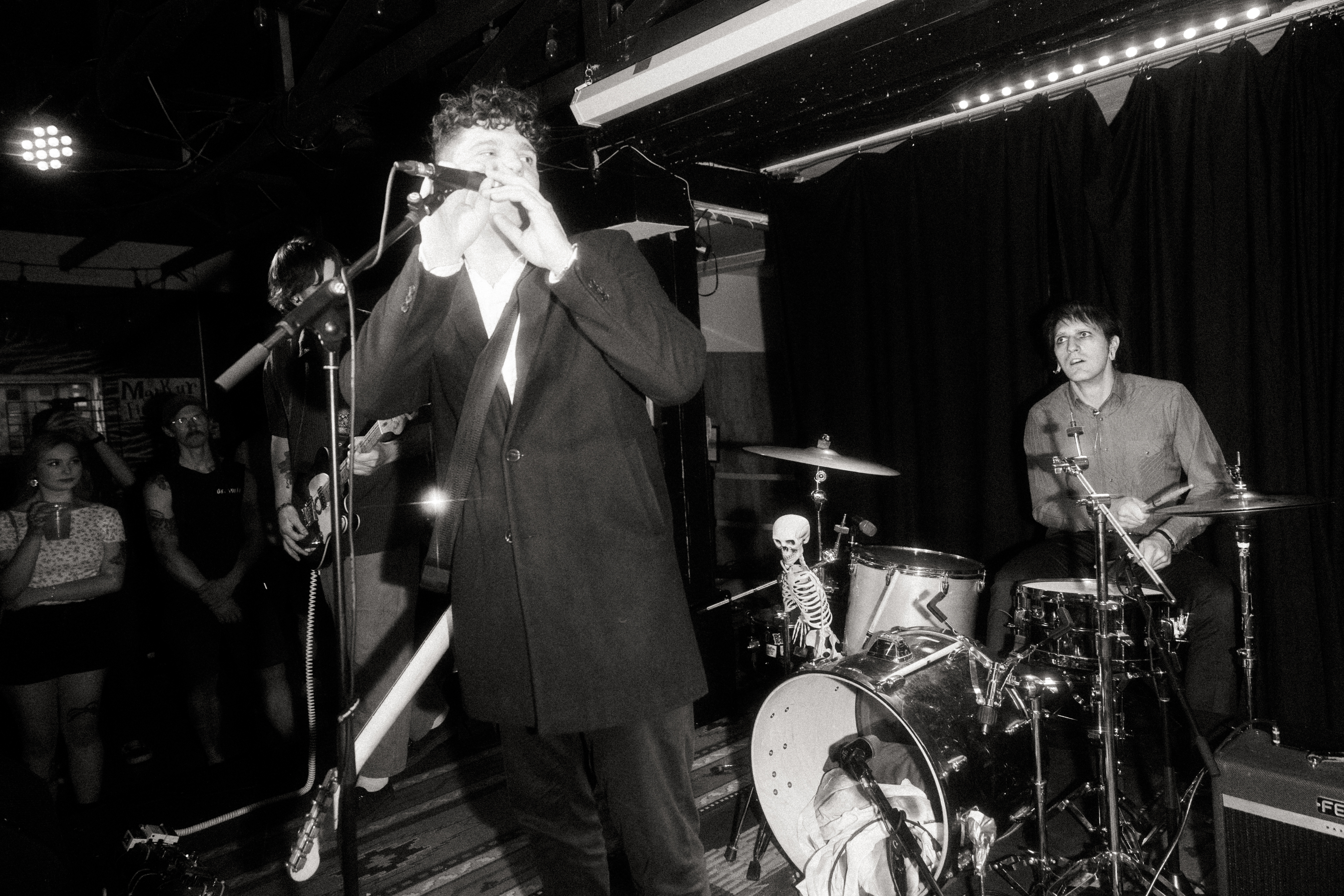 Etiquette performing live on stage